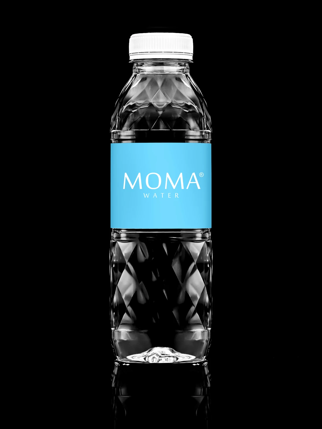 The MOMAwater 300mL bottle on black.